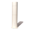A white Aura Scent Diffuser standing upright with a cylindrical shape.